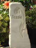 Sandstone obelisk with hand carving
